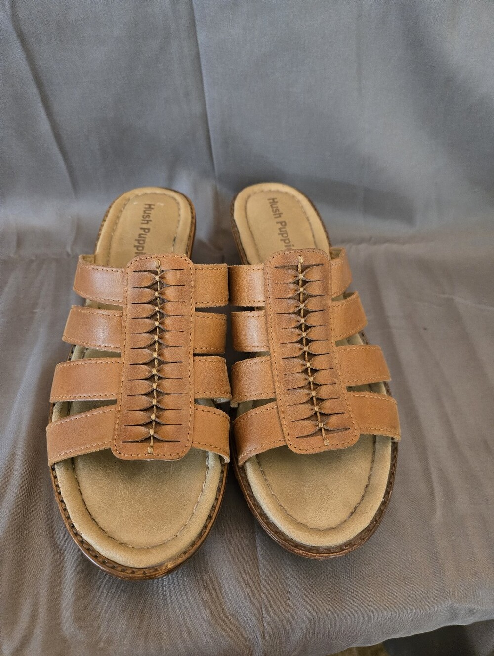 Hush Puppies Roux tan leather wedge sandals featuring woven strap  Size 7